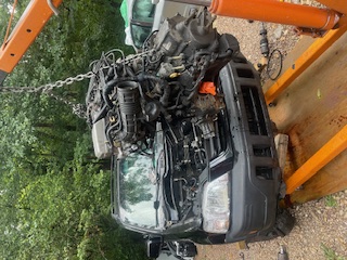 Me and a friend pulling a motor out